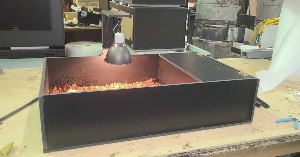 simple compact black tortoise table box with heat lamp