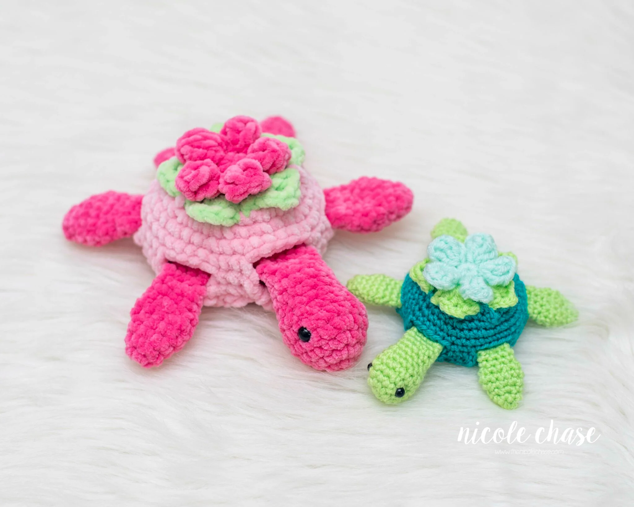 Pink and teal crochet flower turtles with removable shells, a beginner-friendly pattern