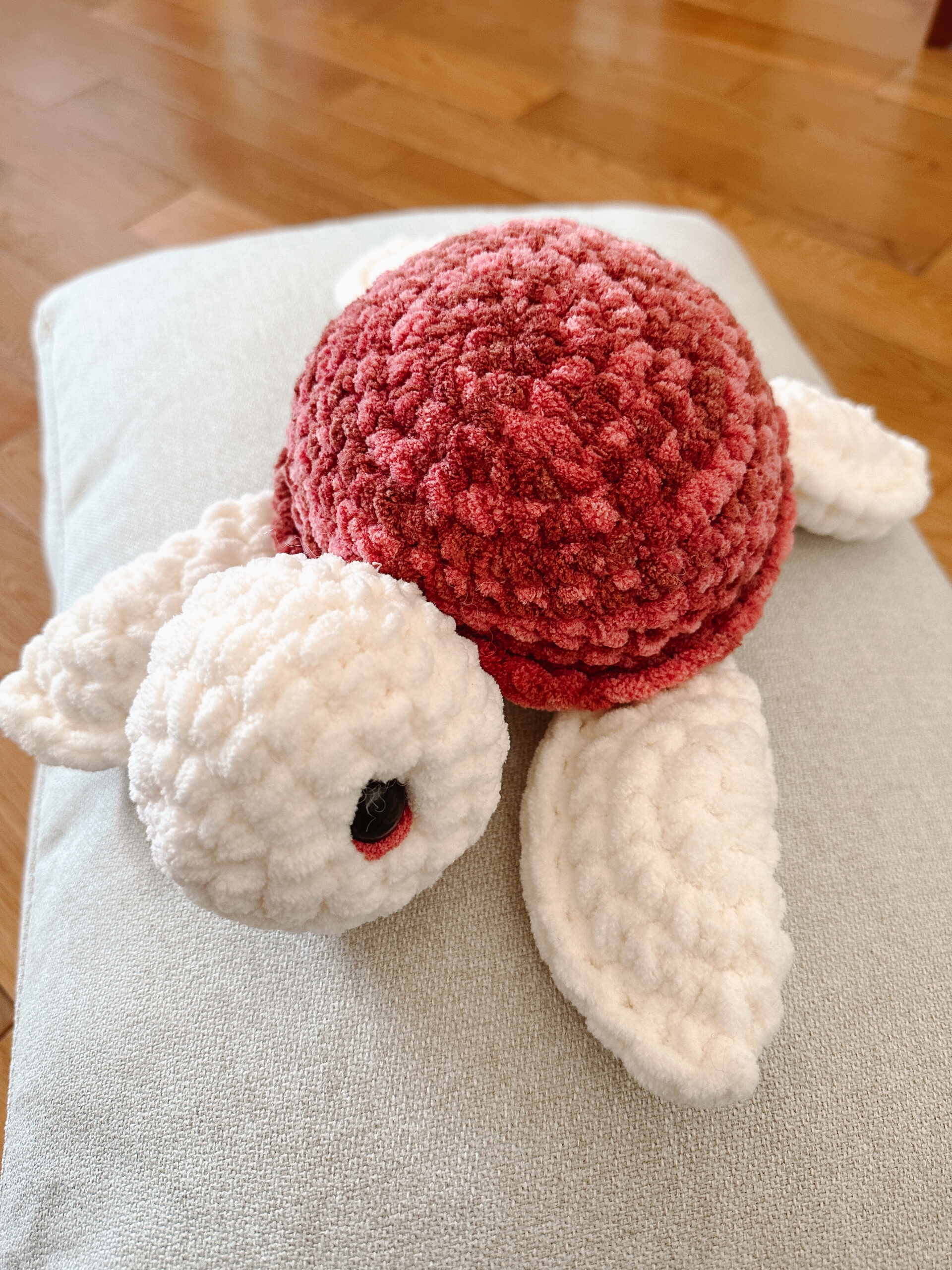 Large cute crochet sea turtle named Fred with a round contrasting shell