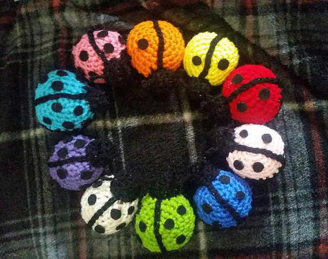 Crochet ladybug counting game with numbered leaves by Crochet by Coraggio